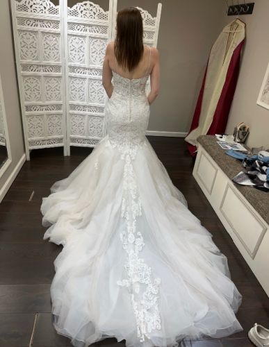 Never worn wedding dress for sale